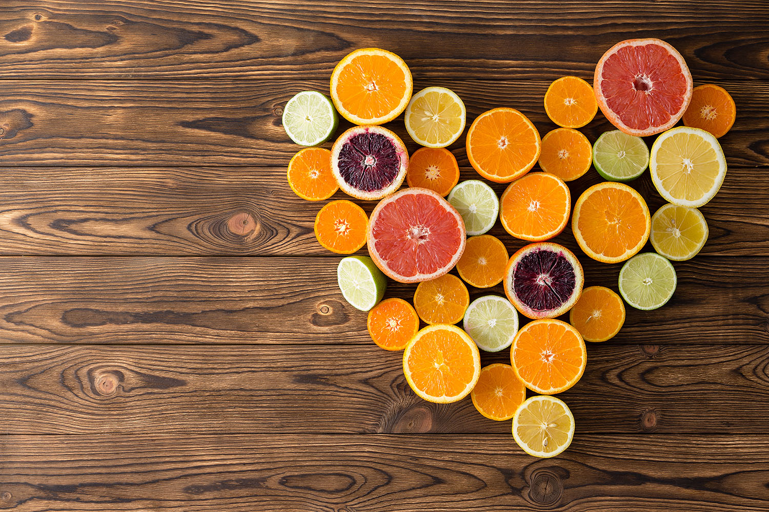 Heart-shaped arrangement of citrus fruits