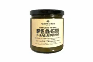 retail jar of peach and jalapeño jam