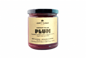 Jar of plum jam for retail