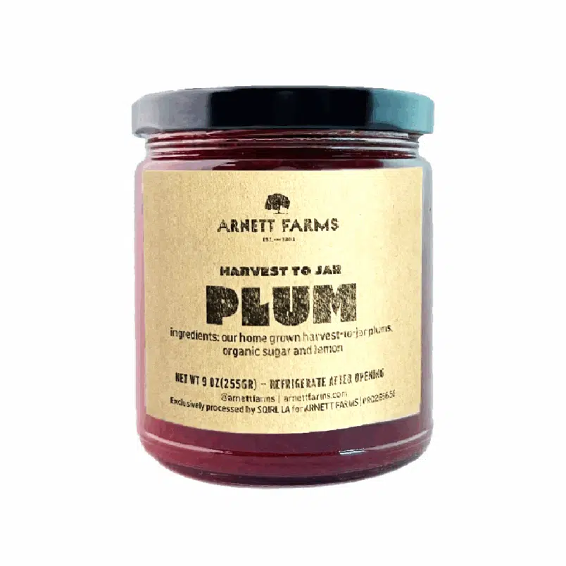 Jar of plum jam for retail